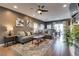 Cozy living room showcasing hardwood floors and an abundance of space for entertaining at 8736 Summoners Ct, Las Vegas, NV 89139