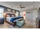 Comfortable primary bedroom featuring a ceiling fan, soft rug, and soothing color scheme at 8736 Summoners Ct, Las Vegas, NV 89139