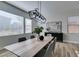 Modern dining room showcasing a light wood table, gray chairs, and stylish decor at 9303 Oxbow Lake Ave, Las Vegas, NV 89149