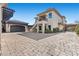 Spacious residence featuring a two-story design and a separate garage at 10000 Cresent Mesa Ln, Las Vegas, NV 89145