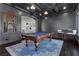 Sophisticated game room with a pool table, custom millwork, and stylish lighting at 10000 Cresent Mesa Ln, Las Vegas, NV 89145