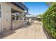 Luxurious outdoor space with a stone-clad shower and a beautifully designed patio area at 10000 Cresent Mesa Ln, Las Vegas, NV 89145