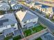 An aerial view shows the meticulously landscaped backyard with custom putting green in a well-planned community at 10116 Rebel Coast St, Las Vegas, NV 89141