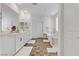 Bright bathroom featuring a modern vanity and separate tub and glass shower at 10116 Rebel Coast St, Las Vegas, NV 89141