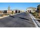 Community entrance with gate and well maintained landscaping adds security and curb appeal to the neighborhood at 10116 Rebel Coast St, Las Vegas, NV 89141