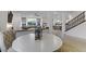 Open floor plan dining area features lots of natural light and views to the living area at 10116 Rebel Coast St, Las Vegas, NV 89141