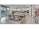 Open dining room area features a view to the backyard and gourmet kitchen at 10116 Rebel Coast St, Las Vegas, NV 89141
