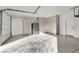 Well-lit garage with ample storage, epoxy flooring, and overhead lighting at 10116 Rebel Coast St, Las Vegas, NV 89141