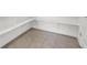 Walk-in pantry features ample shelving space and tile flooring for convenient storage at 10116 Rebel Coast St, Las Vegas, NV 89141