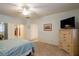 Large bedroom with access to the bathroom and closets at 10313 Echo View Ave, Las Vegas, NV 89129