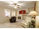 Living room with fireplace and comfortable seating at 10313 Echo View Ave, Las Vegas, NV 89129