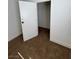 Bedroom with neutral carpet, baseboards, and door leading to closet at 1108 Smith St, Las Vegas, NV 89108