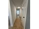 Hallway with fresh paint, updated fixtures, and modern floors at 1108 Smith St, Las Vegas, NV 89108