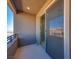 Private balcony with sliding glass doors and mountain views at 11904 Vector Ray Ave, Las Vegas, NV 89138