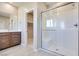 Bathroom with walk-in shower and modern vanity at 11904 Vector Ray Ave, Las Vegas, NV 89138