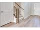 Light and bright entryway with stairs and hardwood floors at 11904 Vector Ray Ave, Las Vegas, NV 89138