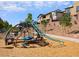 Modern community playground with a large slide and climbing structure, providing a fun and safe environment at 11904 Vector Ray Ave, Las Vegas, NV 89138