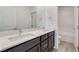 Modern bathroom boasts double vanity and a relaxing bathtub at 1225 Crimson Sunbird St, North Las Vegas, NV 89084