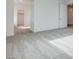 Bright and airy bedroom with grey carpet and an open closet at 1225 Crimson Sunbird St, North Las Vegas, NV 89084