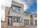 Modern two-story home with stone accents and two-car garage at 1225 Crimson Sunbird St, North Las Vegas, NV 89084