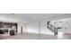 Open concept kitchen with island and stainless steel appliances at 1225 Crimson Sunbird St, North Las Vegas, NV 89084