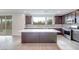 Modern kitchen with large island and stainless steel appliances at 1225 Crimson Sunbird St, North Las Vegas, NV 89084