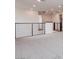 Spacious loft area with modern railing and carpet flooring at 1225 Crimson Sunbird St, North Las Vegas, NV 89084