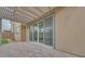 Relaxing patio with covered pergola and sliding glass doors at 1225 Crimson Sunbird St, North Las Vegas, NV 89084