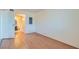 Bedroom with wood flooring and a view of the bathroom at 1361 E University Ave # 209, Las Vegas, NV 89119