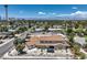 Expansive aerial view showcasing the property, lush landscaping, and panoramic city views at 1420 S 8Th St, Las Vegas, NV 89104