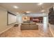 Spacious basement with a large screen, pool table, kitchenette, and ample seating at 1420 S 8Th St, Las Vegas, NV 89104