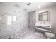 Sleek bathroom featuring stylish tile work in shower and floating sink vanity at 1420 S 8Th St, Las Vegas, NV 89104