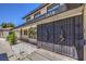 Gated home entrance featuring desert landscaping, a walkway, and the home's address above at 1420 S 8Th St, Las Vegas, NV 89104