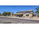 A large two-story brick house with black metal fencing at 1420 S 8Th St, Las Vegas, NV 89104