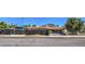 A two-story home with a large gate for privacy at 1420 S 8Th St, Las Vegas, NV 89104