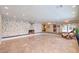 Spacious living room with stone accent wall and fireplace, creating a warm and inviting atmosphere at 1420 S 8Th St, Las Vegas, NV 89104