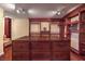 Custom walk-in closet with built-in wood island and shelving, perfect for organizing clothes and accessories at 1420 S 8Th St, Las Vegas, NV 89104