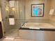 Spa-like bathroom with soaking tub and walk-in shower at 145 E Harmon Ave # 2306, Las Vegas, NV 89109