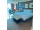 King size bed, sitting area, and large window at 145 E Harmon Ave # 2306, Las Vegas, NV 89109