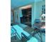 Small dining area with table and chairs near kitchenette at 145 E Harmon Ave # 2306, Las Vegas, NV 89109