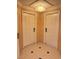 Apartment entryway with two doors and tile floor at 145 E Harmon Ave # 2306, Las Vegas, NV 89109