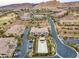 Aerial view of community with pool, landscaping, and multiple homes at 19 Via Visione # 204, Henderson, NV 89011