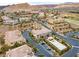 Aerial view of community with pool, landscaping, and multiple homes at 19 Via Visione # 204, Henderson, NV 89011