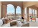 Relaxing balcony with sectional sofa and outdoor lighting at 19 Via Visione # 204, Henderson, NV 89011