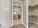 Bathroom with double sinks, a shower, and built in shelving at 19 Via Visione # 204, Henderson, NV 89011