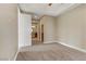 Spacious bedroom with carpet flooring and access to bathroom and closets at 19 Via Visione # 204, Henderson, NV 89011