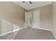 Well-lit bedroom featuring neutral carpeting at 19 Via Visione # 204, Henderson, NV 89011