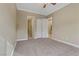 Spacious bedroom with carpet and access to bathroom at 19 Via Visione # 204, Henderson, NV 89011