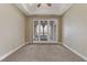 Bedroom with patio doors leading to balcony with scenic views at 19 Via Visione # 204, Henderson, NV 89011