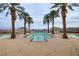 Resort-style pool with palm trees and mountain views at 19 Via Visione # 204, Henderson, NV 89011